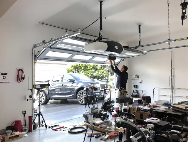 Portsmouth Garage Door Repair specialist installing smart garage door opener system in Portsmouth home