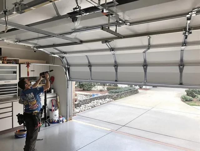 Garage door track repair service by Portsmouth Garage Door Repair in Portsmouth
